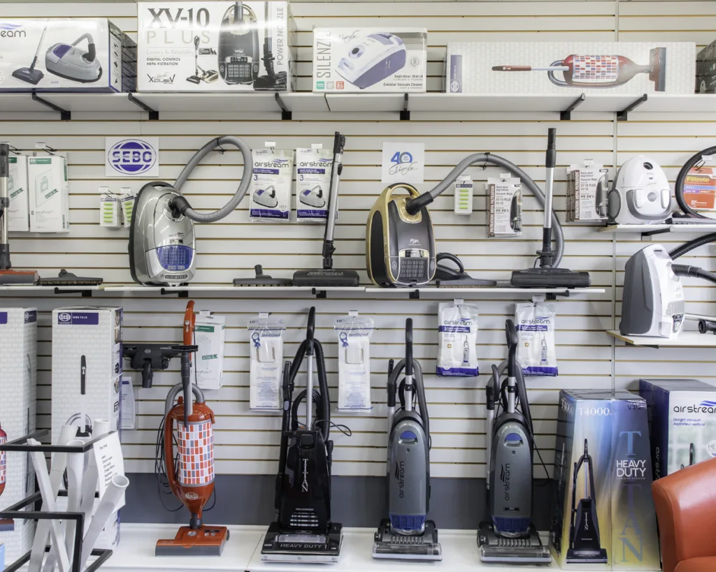Elmira Vacuum vacuum display of upright vacuums, stick vacuums and canister vacuums by Airstreem, Johnny Vac, Sebo and Titan in Elmira, Ontario